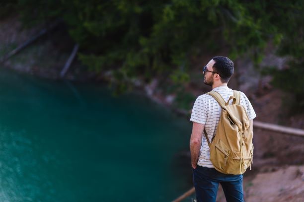 handsome-bearded-man-with-hands-in-his-pockets-loo-W79C5DB